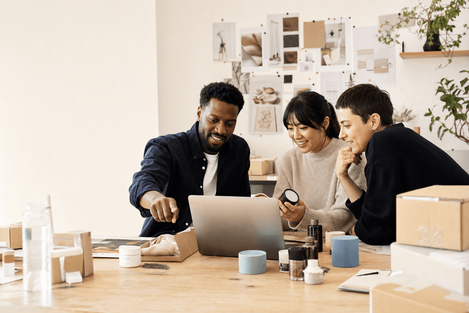 ELUX commerce and software team collaborating in a bright product studio